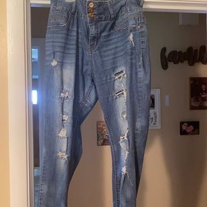 Ripped dark blue jeans